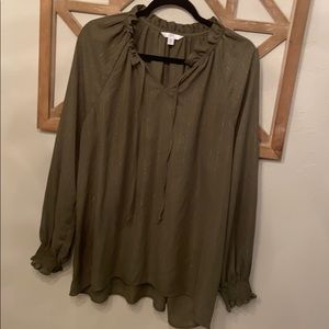 Olive green peasant top with little shimmer lines.